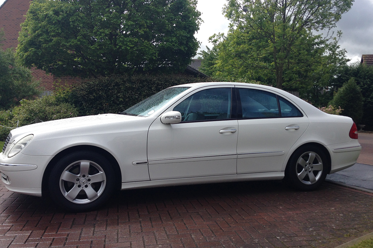 White stretched Mercedes E-Class seven seater limousine
